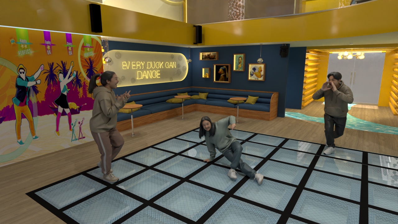 Teens dancing on a glowing glass-tile dance floor in front of a projected dance game and a navy banquette